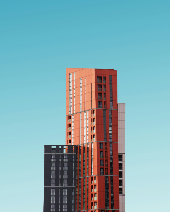 An Image of a tall orange building in the United Kingdom